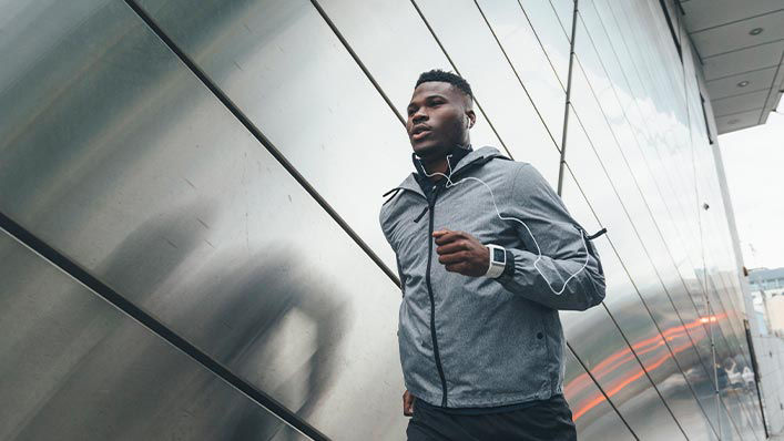 Young athletic African American man out for a run.