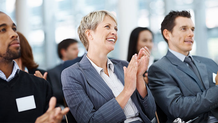 Group of people clapping