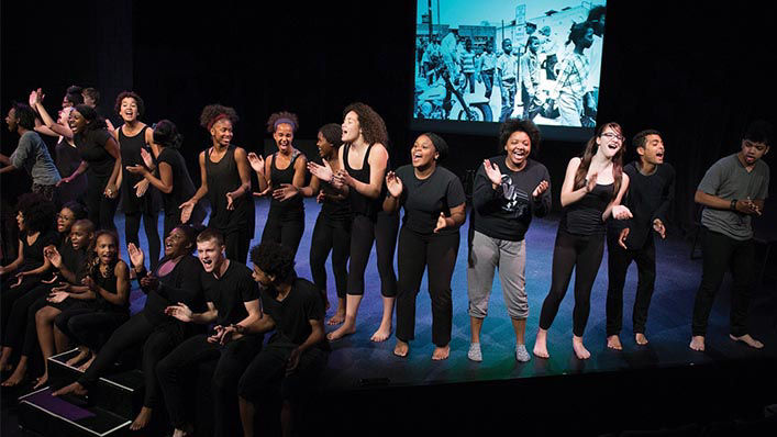 Casts on the stage clapping at the Penumbra Theatre